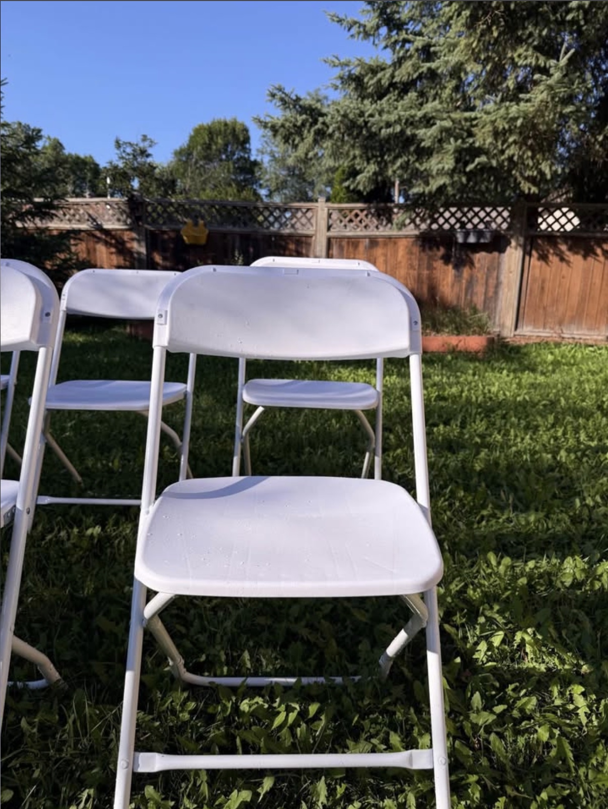 White event chair for a Winnipeg wedding rental guide